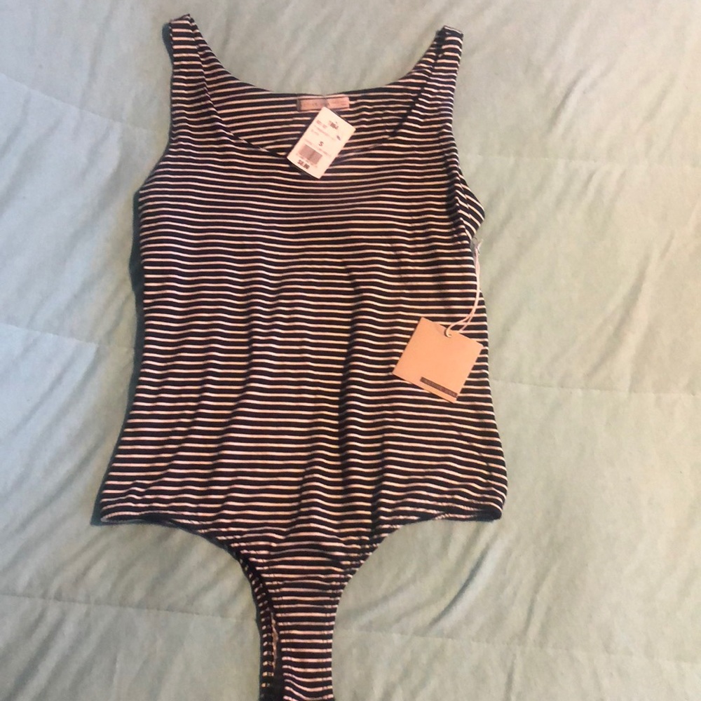 Black and white strip body suit